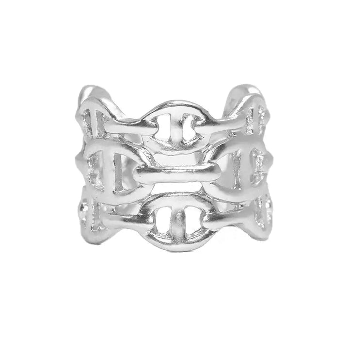 a silver ring with two intertwined links