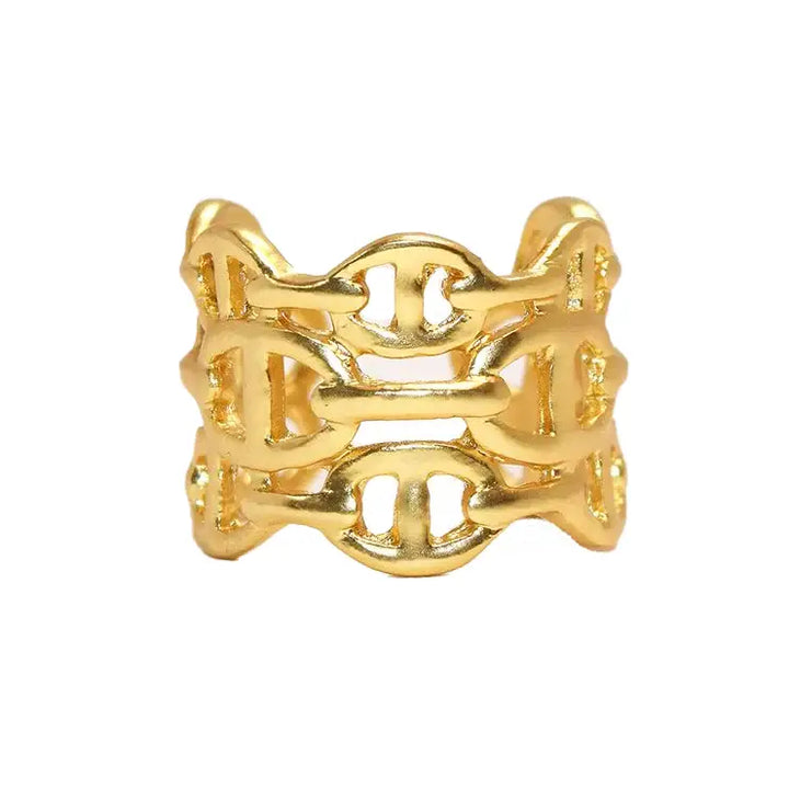 a gold ring with two intertwined links