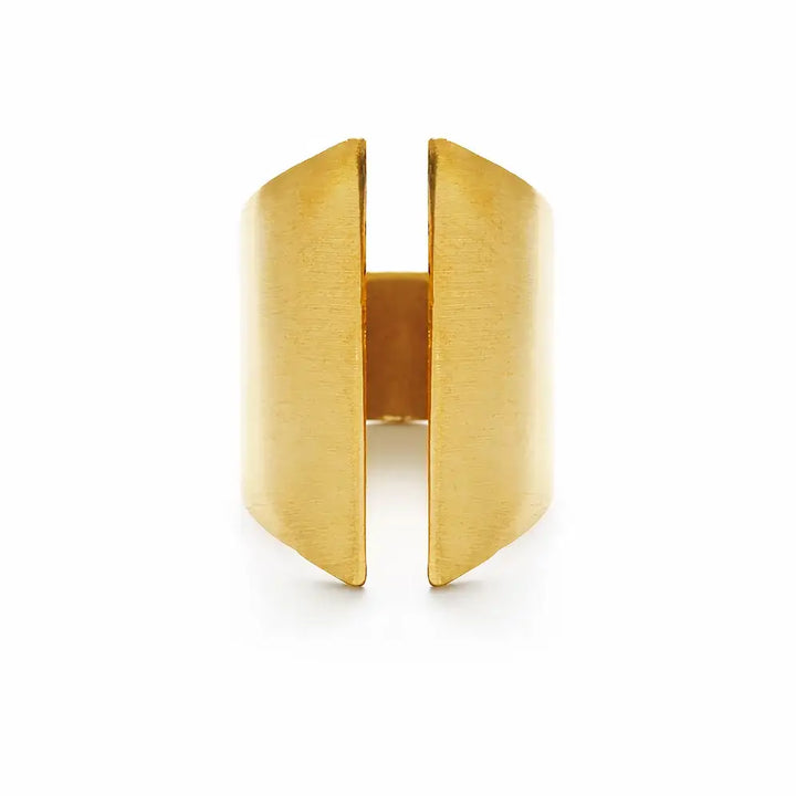 a gold plated ring on a white background