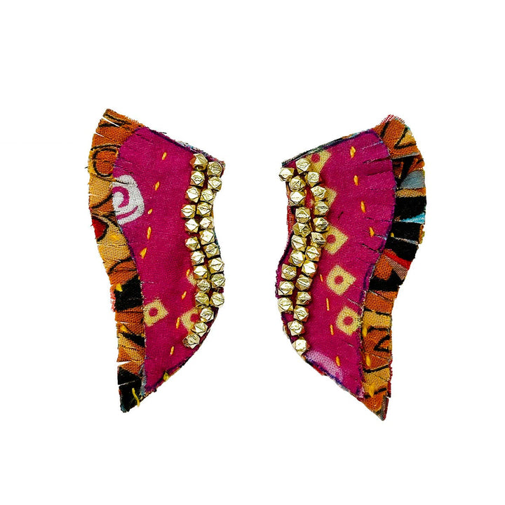 a pair of pink and gold earrings on a white background