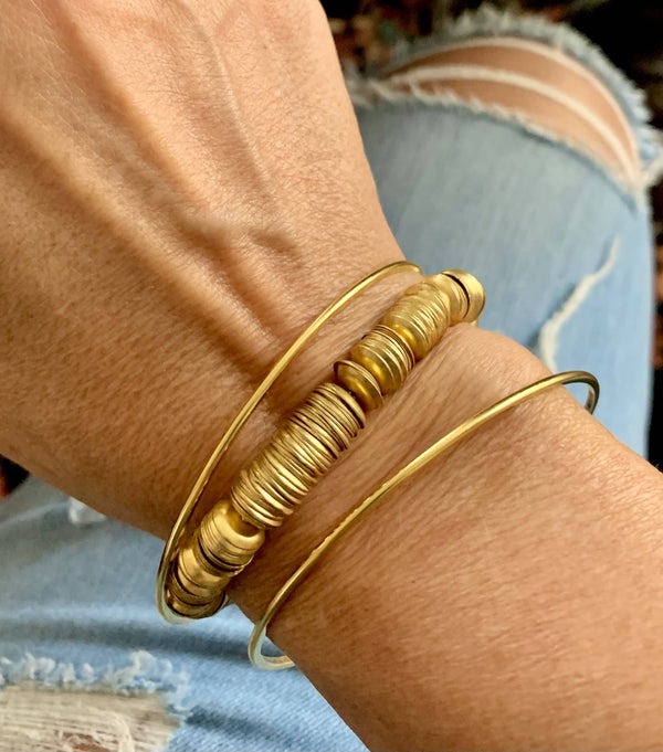 a close up of a person wearing a bracelet