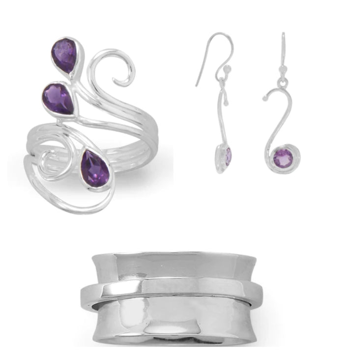 a set of jewelry including a ring and earrings