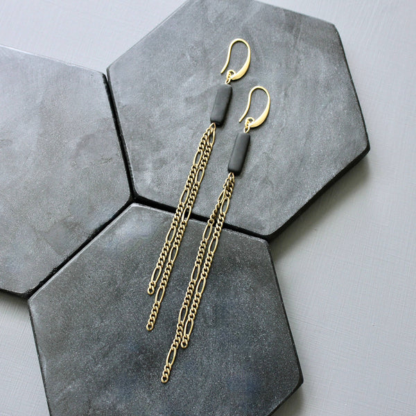 brass and black shoulder duster earrings