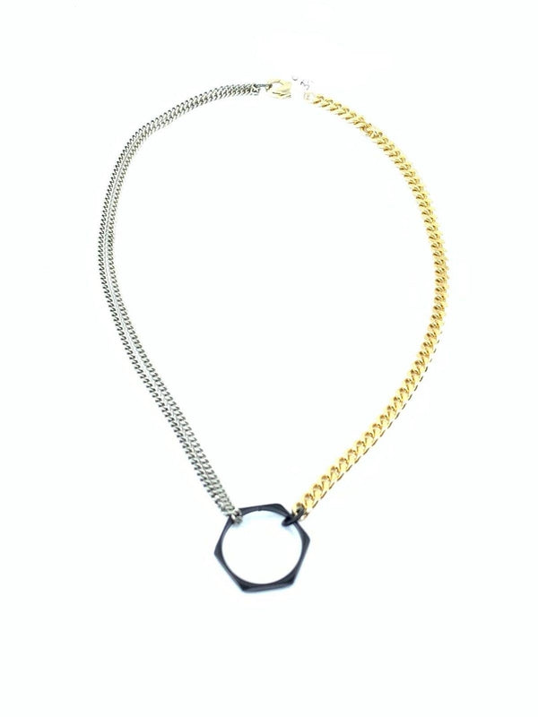 a necklace with a circle on a chain