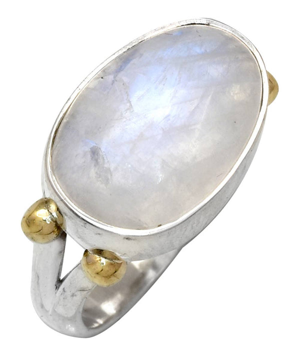 a ring with a large white stone in it